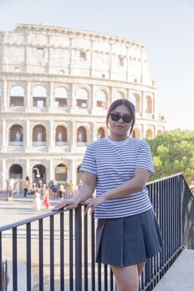 Professional photoshoot at the Colosseum in Rome — photo by Felice Scala, Smiler