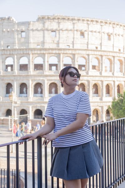 Professional photoshoot at the Colosseum in Rome — photo by Felice Scala, Smiler