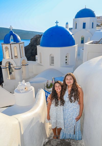 Professional photoshoot at Oia Village in Santorini — photo by G Antoniou, Smiler