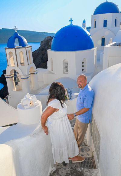 Professional photoshoot at Oia Village in Santorini — photo by G Antoniou, Smiler