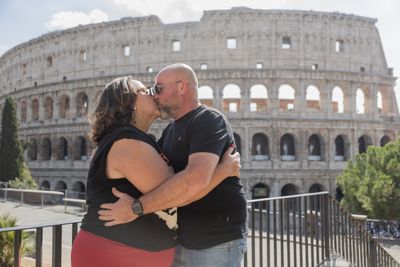 Professional photoshoot at the Colosseum in Rome — photo by Felice Scala, Smiler