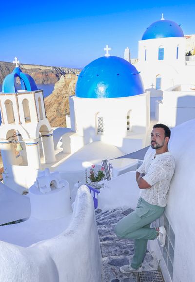 Professional photoshoot at Oia Village in Santorini — photo by G Antoniou, Smiler