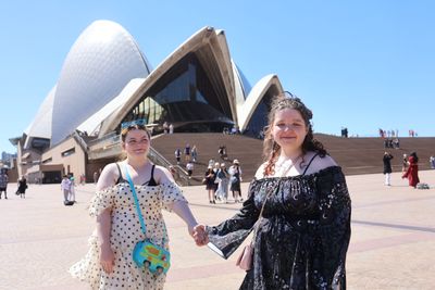 Photoshoot at the Opera House, Sydney in Sydney — photo by Zach Deng, Smiler
