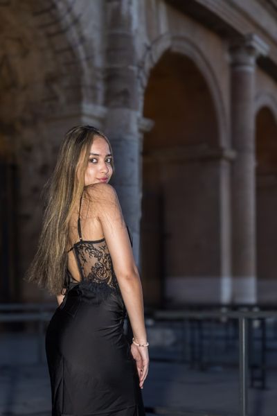 Professional photoshoot at the Colosseum in Rome — photo by Felice Scala, Smiler