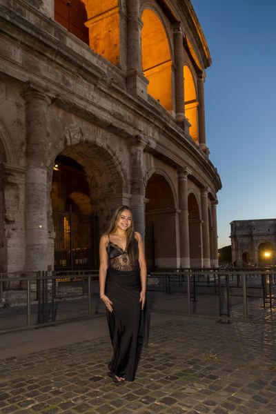 Professional photoshoot at the Colosseum in Rome — photo by Felice Scala, Smiler