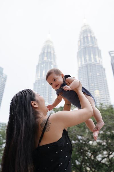 Photoshoot at Petronas Towers, Kuala Lumpur in Kuala Lumpur — photo by Satyaseelan Sivam, Smiler