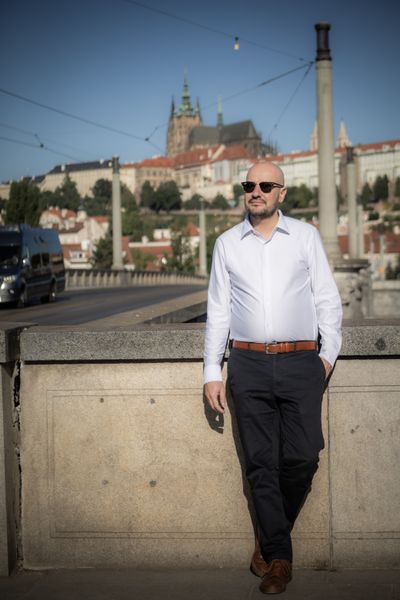 Professional photoshoot at Prague old town in Prague — photo by Silviu Robu, Smiler