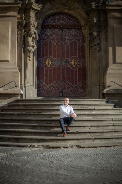 Professional photoshoot at Prague old town in Prague — photo by Silviu Robu, Smiler