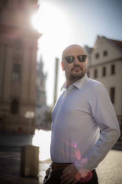 Professional photoshoot at Prague old town in Prague — photo by Silviu Robu, Smiler